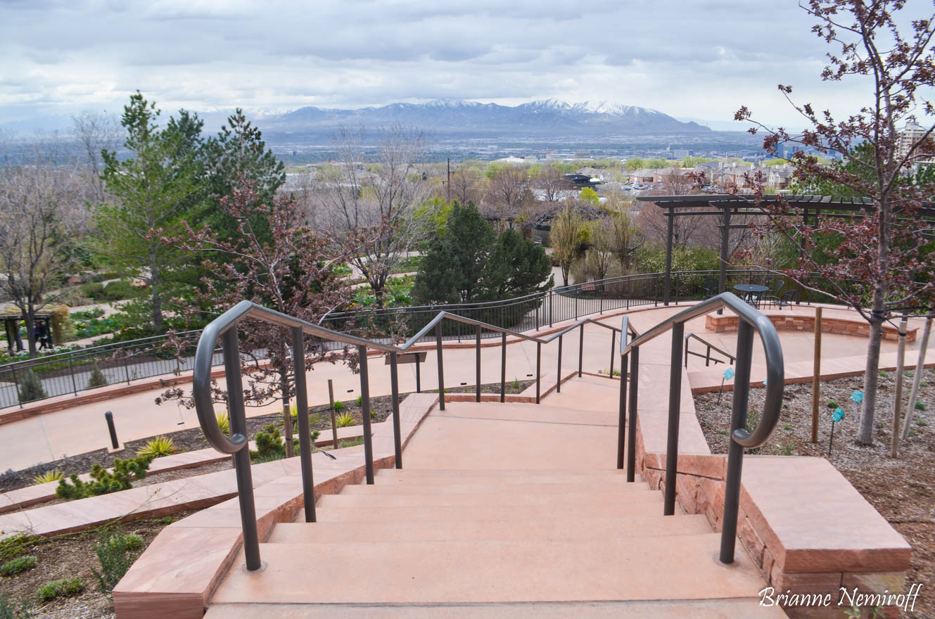 A staircase at Red Butte Garden in Salt Lake City with a view of the mountains for post-pandemic travel