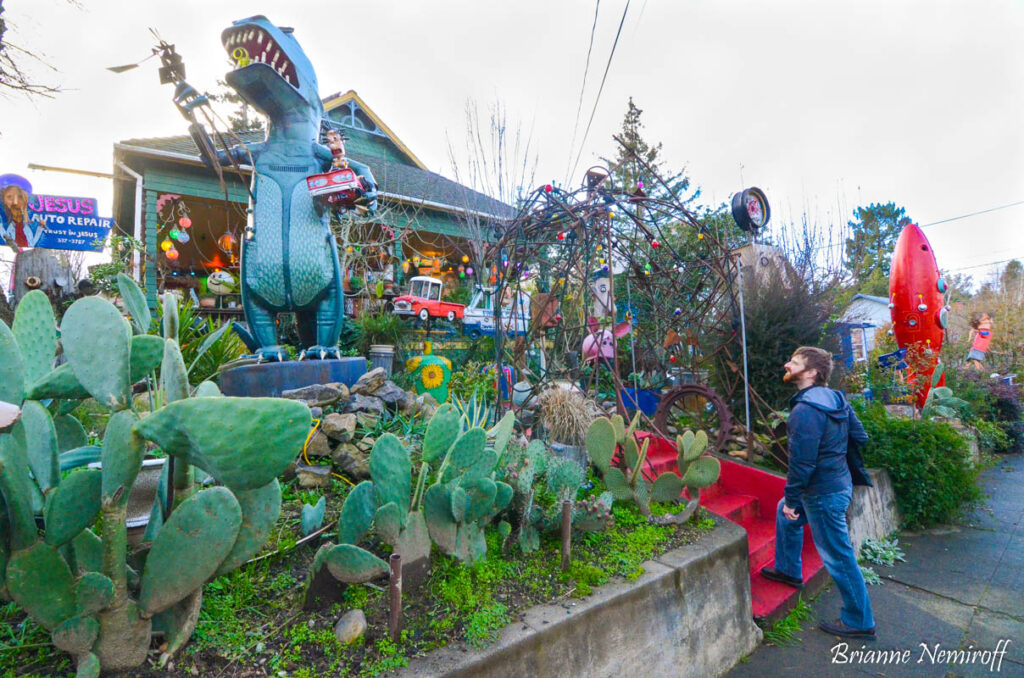 Benjamin Hagerty at Patrick Amiot sculpture on Florence Avenue in Sebastopol