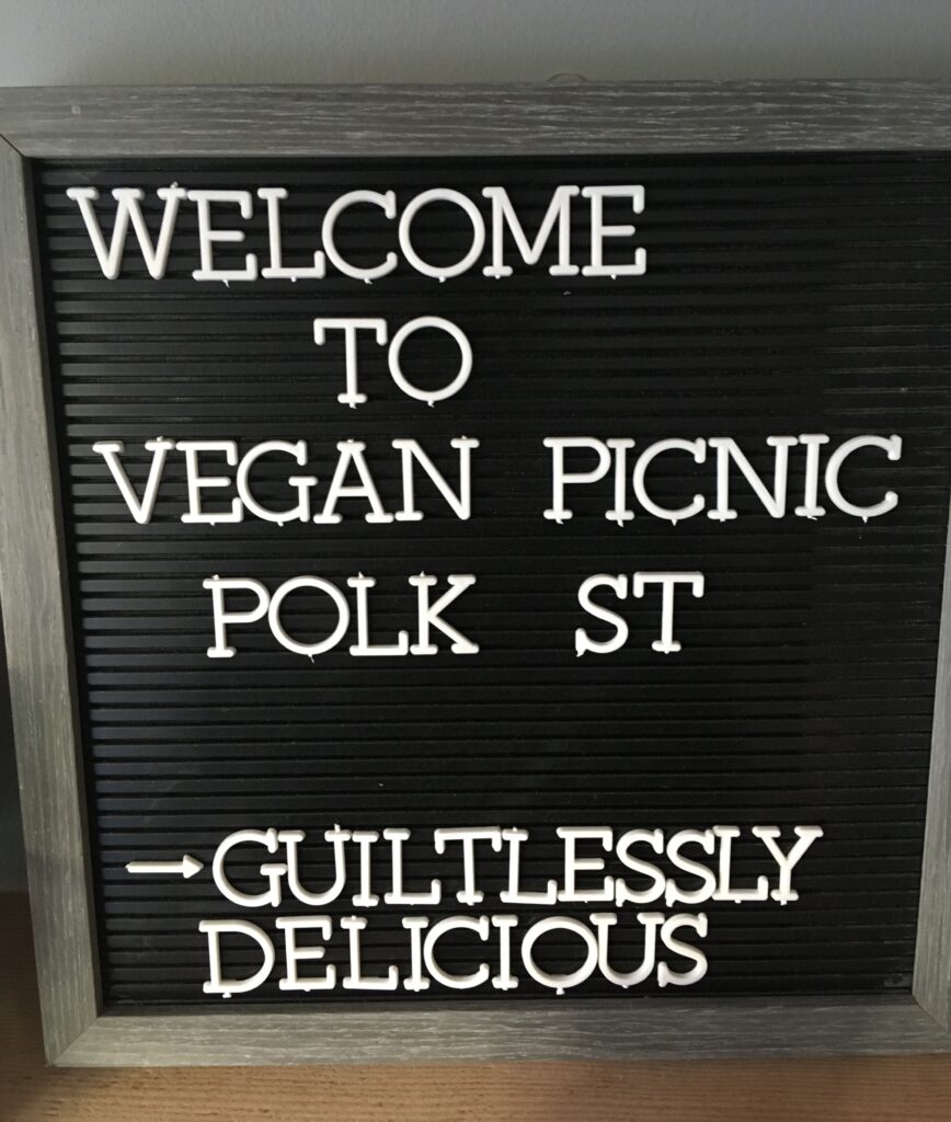 Vegan picnic sign in San Francisco_ BensVeganVancouver_It'sBreeandBen_TheQuietVegans _