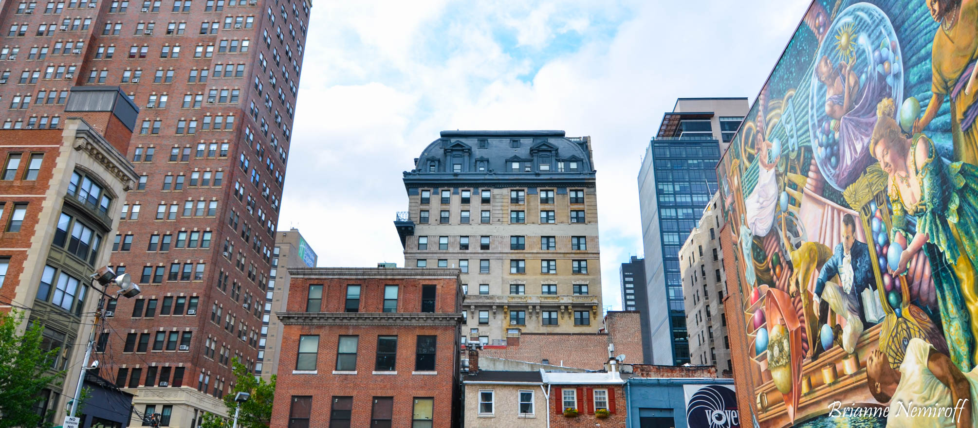 Mural and city skyline at 13th and Locust Street in Center City downtown Philadelphia