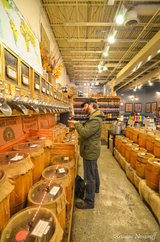 Benjamin Hagery of It's Bree and Ben choosing coffee at Allegheny Coffee & Tea Exchange