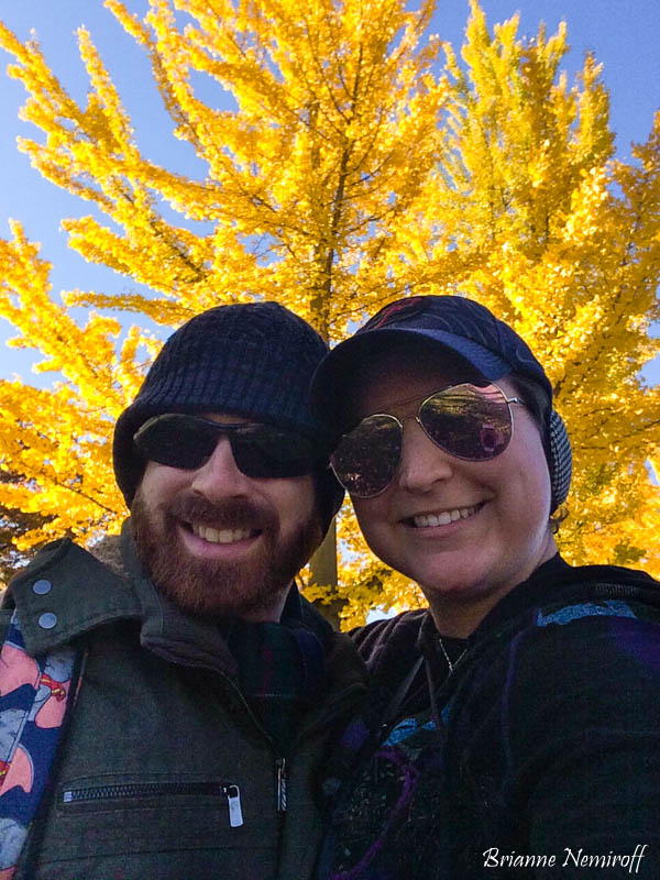 Benjamin Hagerty and Brianne Nemiroff of It's Bree and Ben at Frick Park with fall foliage