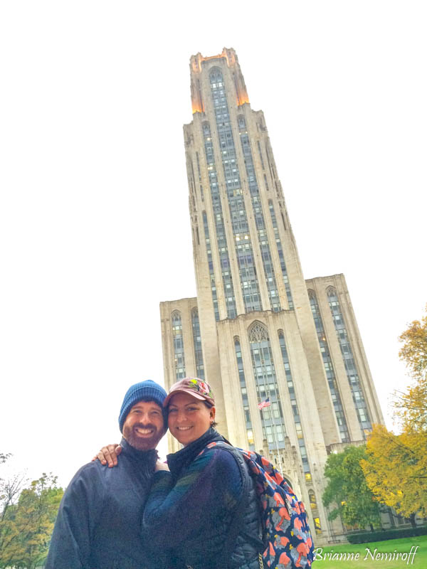 Brianne Nemiroff and Benjamin Hagerty of It's Bree and Ben posing in front of the Cathedral of Learning